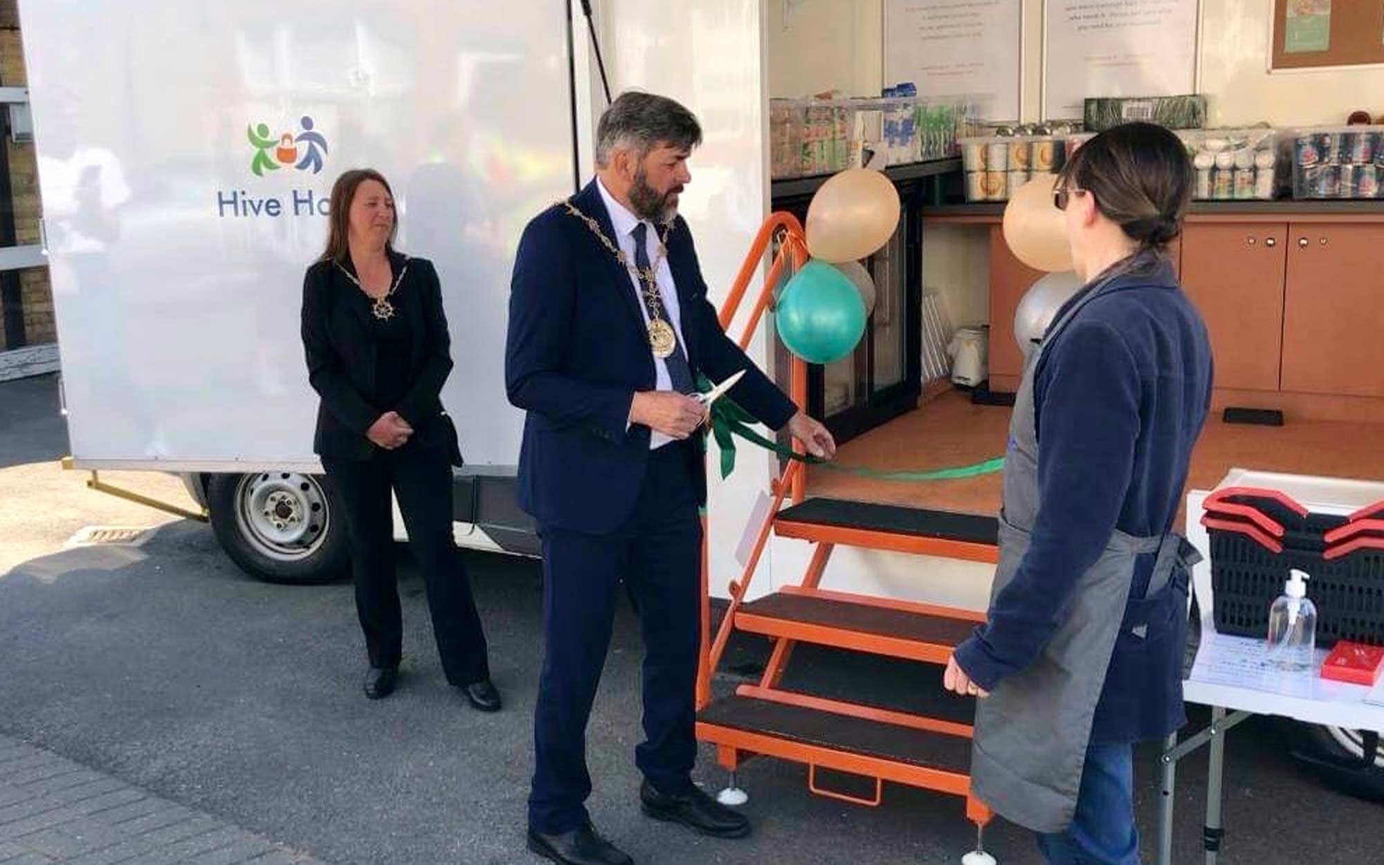 Cutting the ribbon to launch Barry the mobile foodbank